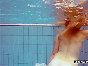 uber-cute sandy-haired plays naked underwater