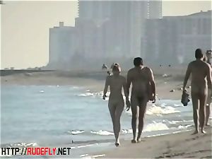 peeping at a super hot naturist couple on the beach