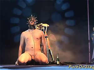 mischievous fetish injection needle showcase on stage