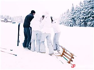 Playful skier Nikky desire takes her trainer's cock in the snow