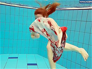scorching polish red-haired swimming in the pool